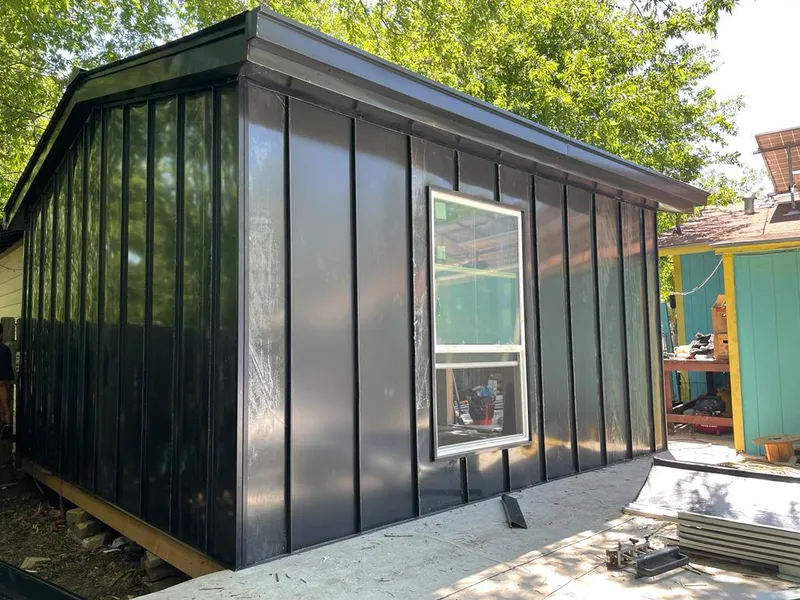 Black standing seam metal wall panels for Roof Inspection in Emmaus